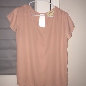 a beautiful pinkish color shirt!!